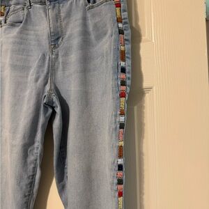 Stylish Light Blue Jeans with Multicolor Side Stripes